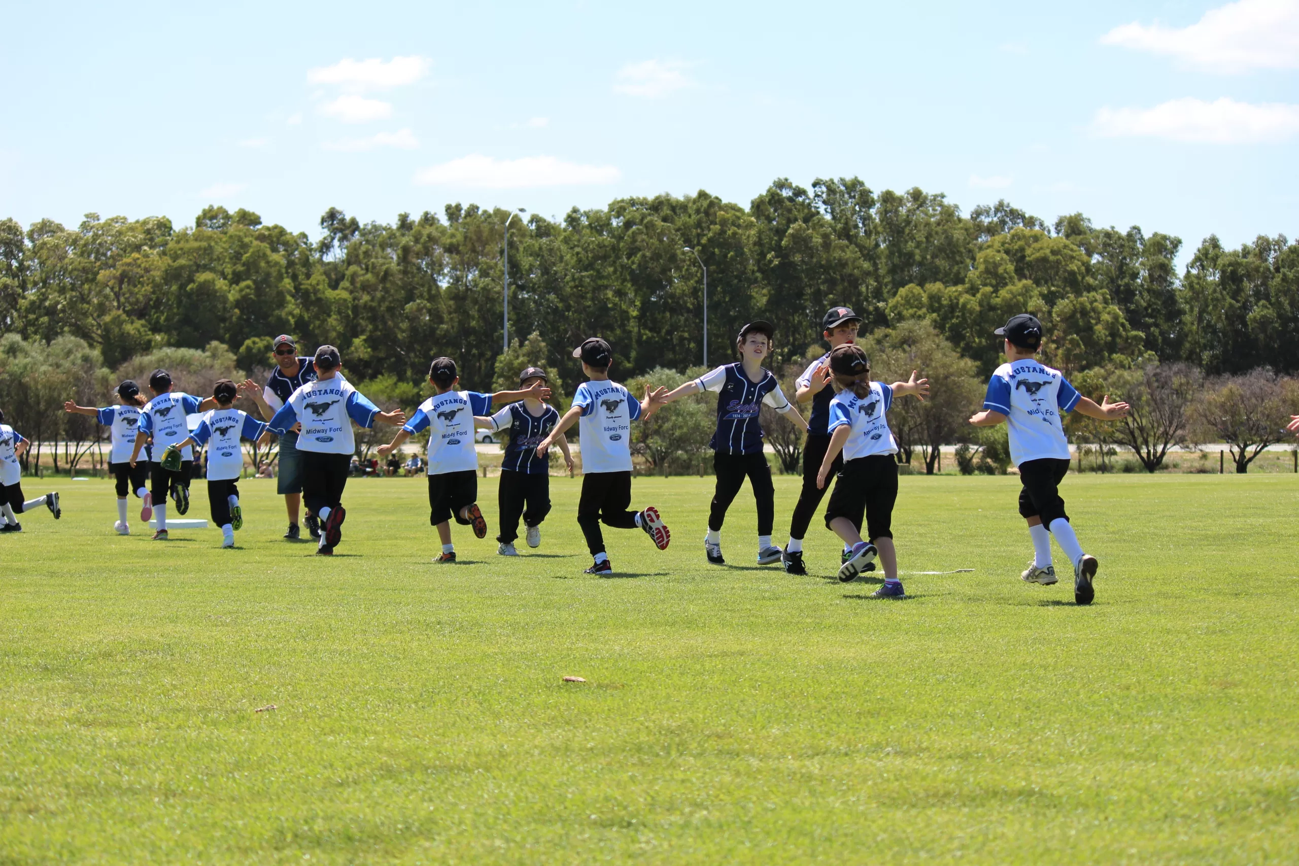 Teams high-fiving each other after a well played game